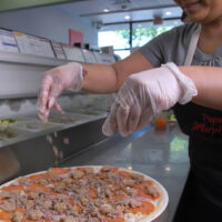 making a meat pizza